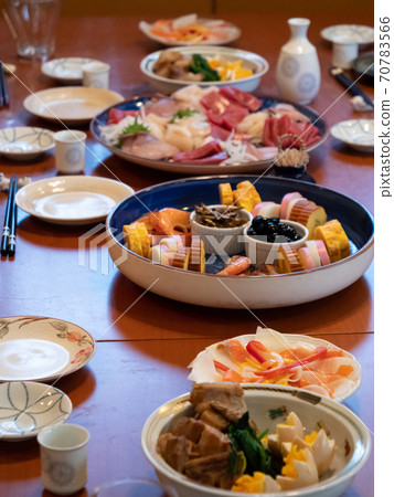 The table being set for a traditional new year's dinner in Japan The table being set for a traditional new year's dinner in Japan 70783566