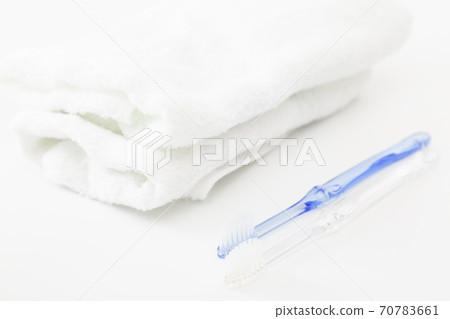 Towel and toothbrush 70783661