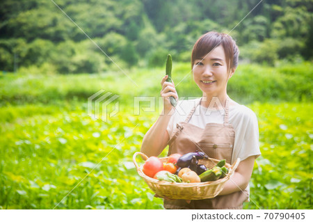 Women with vegetables Women with vegetables 70790405