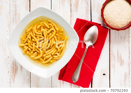 Italian passatelli in broth Italian passatelli in broth 70792293