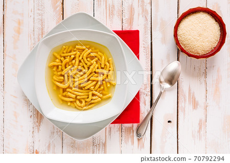 Italian passatelli in broth Italian passatelli in broth 70792294