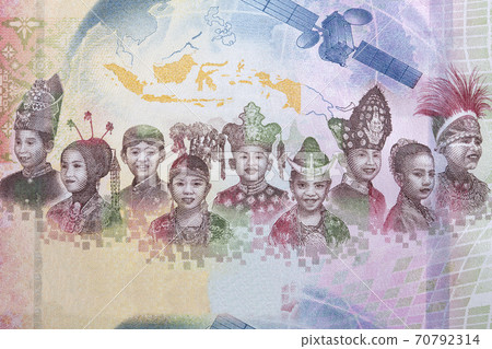 Children in various traditional Indonesian costumes from money 70792314