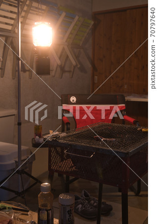 A barbecue with a glowing lantern A barbecue with a glowing lantern 70797640