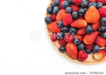 fresh blueberry, strawberry and rasberry on white fresh blueberry, strawberry and rasberry on white 70798134