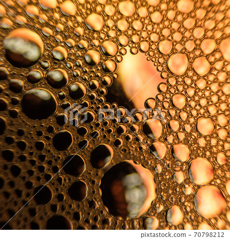 Orange water droplets background with yellow background Orange water droplets background with yellow background 70798212