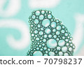 Bubble texture background. Big foam bubbles pattern. Blue ornament of soap spheres. 70798237