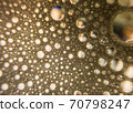 Gold water drops on bubble background 70798247