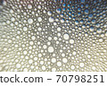 Gold water drops on bubble background 70798251