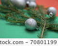 Christmas photos with silver tree balls and conifer branches on a red-green background 70801199
