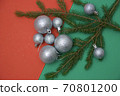 Simple Christmas photos with silver tree balls and conifer branches on a red-green background 70801200