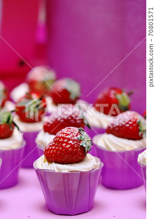 I took a close-up shot of a strawberry cupcake 70801571