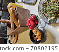 Fresh strawberries in a glass bowl on a light-colored table. Light diet Breakfast 70802195