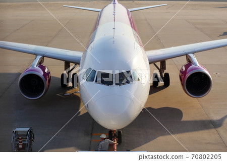 Jet airliner waiting Jet airliner waiting 70802205