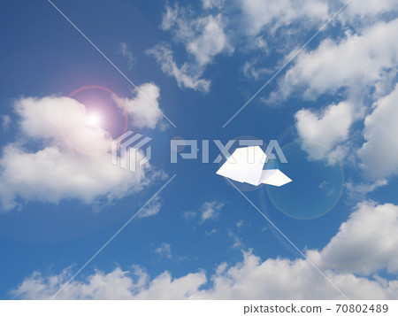 Paper airplane flying in the sky Paper airplane flying in the sky 70802489