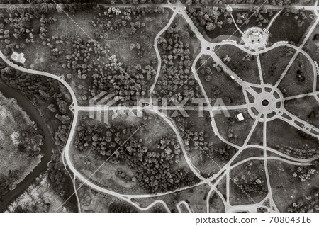 View from the height of loshitsky Park in Minsk.Winding paths in Loshitsky Park.Belarus.Apple orchard.Black and white photo. View from the height of loshitsky Park in Minsk.Winding paths in Loshitsky Park.Belarus.Apple orchard.Black and white photo. 70804316