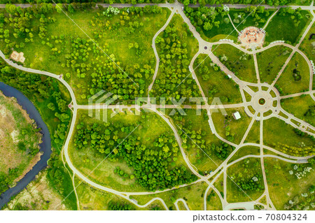 View from the height of the loshitsky Park in Minsk.Winding paths in loshitsky Park.Belarus.Apple orchard View from the height of the loshitsky Park in Minsk.Winding paths in loshitsky Park.Belarus.Apple orchard 70804324