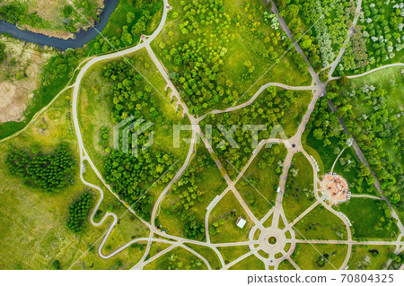 View from the height of the loshitsky Park in Minsk.Winding paths in loshitsky Park.Belarus.Apple orchard View from the height of the loshitsky Park in Minsk.Winding paths in loshitsky Park.Belarus.Apple orchard 70804325