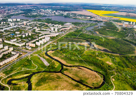 View from the height of the houses and loshitsky Park in a residential area of Minsk, spring loshitsky Park in the residential area of Serebryanka.Belarus View from the height of the houses and loshitsky Park in a residential area of Minsk, spring loshitsky Park in the residential area of Serebryanka.Belarus 70804329