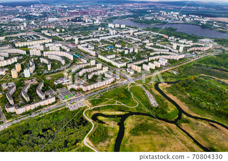 View from the height of the houses and loshitsky Park in a residential area of Minsk, spring loshitsky Park in the residential area of Serebryanka.Belarus View from the height of the houses and loshitsky Park in a residential area of Minsk, spring loshitsky Park in the residential area of Serebryanka.Belarus 70804330