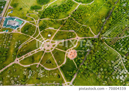 View from the height of the loshitsky Park in Minsk.Winding paths in loshitsky Park.Belarus.Apple orchard View from the height of the loshitsky Park in Minsk.Winding paths in loshitsky Park.Belarus.Apple orchard 70804339