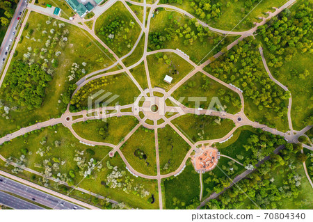 View from the height of the loshitsky Park in Minsk.Winding paths in loshitsky Park.Belarus.Apple orchard View from the height of the loshitsky Park in Minsk.Winding paths in loshitsky Park.Belarus.Apple orchard 70804340