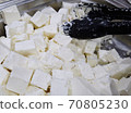 White cheese feta cubes in the store market. Group pieces of milk cheese background. Healthy lifestyle ingredient. 70805230