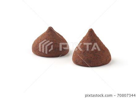 two truffle candies on a white background two truffle candies on a white background 70807344