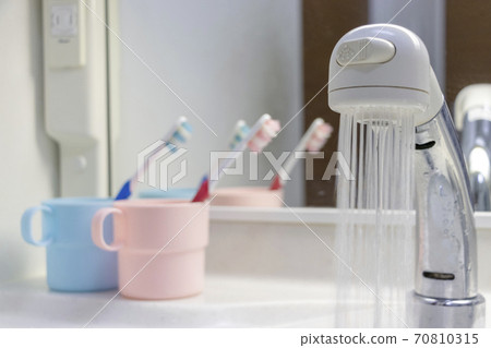 Washbasin shower head and toothpaste 70810315