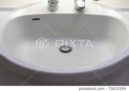 White sink in the washbasin 70810384