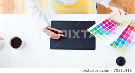Graphic designer using her graphic tablet 70811418
