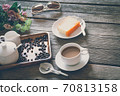 Vintage Film Look: cup of coffee with cake 70813158
