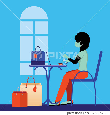 Woman in mask with shopping bags and laptop in cafe 70815788