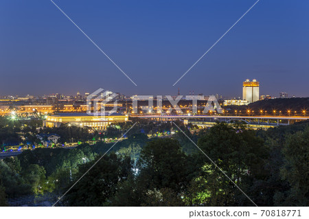 view of central Moscow from Sparrow Hills or Vorobyovy Gory observation (viewing) platform at sunset-- is on a steep bank 85 m above the Moskva river, or 200 m above sea level. Russia 70818771