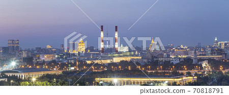view of central Moscow from Sparrow Hills or Vorobyovy Gory observation (viewing) platform at sunset-- is on a steep bank 85 m above the Moskva river, or 200 m above sea level. Russia 70818791