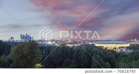 view of central Moscow from Sparrow Hills or Vorobyovy Gory observation (viewing) platform at sunset-- is on a steep bank 85 m above the Moskva river, or 200 m above sea level. Russia view of central Moscow from Sparrow Hills or Vorobyovy Gory observation (viewing) platform at sunset-- is on a steep bank 85 m above the Moskva river, or 200 m above sea level. Russia 70818793