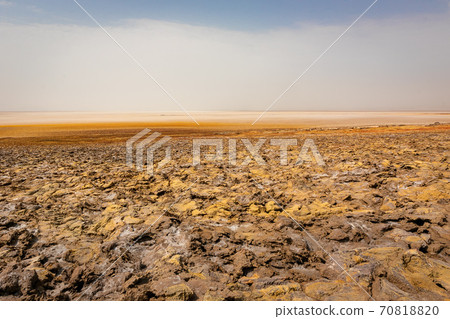 Scenery and sky around the slope to Dallol volcano, stopped by on a tour of the Danakil Desert in Ethiopia Scenery and sky around the slope to Dallol volcano, stopped by on a tour of the Danakil Desert in Ethiopia 70818820