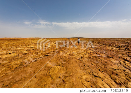 Scenery and sky around the slope to Dallol volcano, stopped by on a tour of the Danakil Desert in Ethiopia Scenery and sky around the slope to Dallol volcano, stopped by on a tour of the Danakil Desert in Ethiopia 70818849