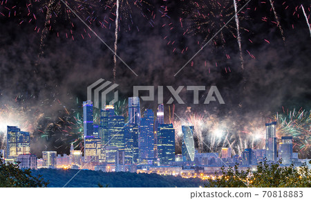 Fireworks over the Moscow city from Sparrow Hills or Vorobyovy Gory observation platform-- is on a steep bank 85 m above the Moskva river, or 200 m above sea level. Russia 70818883