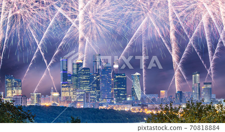 Fireworks over the Moscow city from Sparrow Hills or Vorobyovy Gory observation platform-- is on a steep bank 85 m above the Moskva river, or 200 m above sea level. Russia 70818884