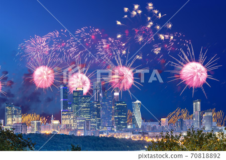 Fireworks over the Moscow city from Sparrow Hills or Vorobyovy Gory observation platform-- is on a steep bank 85 m above the Moskva river, or 200 m above sea level. Russia 70818892