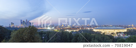 view of central Moscow from Sparrow Hills or Vorobyovy Gory observation (viewing) platform at sunset-- is on a steep bank 85 m above the Moskva river, or 200 m above sea level. Russia view of central Moscow from Sparrow Hills or Vorobyovy Gory observation (viewing) platform at sunset-- is on a steep bank 85 m above the Moskva river, or 200 m above sea level. Russia 70819047