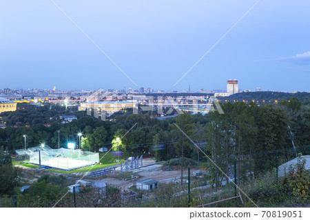 view of central Moscow from Sparrow Hills or Vorobyovy Gory observation (viewing) platform at sunset-- is on a steep bank 85 m above the Moskva river, or 200 m above sea level. Russia 70819051