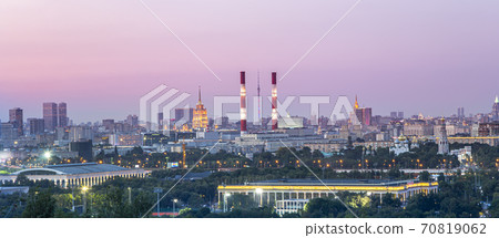 view of central Moscow from Sparrow Hills or Vorobyovy Gory observation (viewing) platform at sunset-- is on a steep bank 85 m above the Moskva river, or 200 m above sea level. Russia 70819062