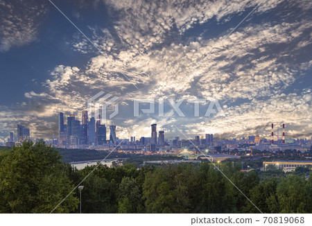 view of central Moscow from Sparrow Hills or Vorobyovy Gory observation (viewing) platform at sunset-- is on a steep bank 85 m above the Moskva river, or 200 m above sea level. Russia view of central Moscow from Sparrow Hills or Vorobyovy Gory observation (viewing) platform at sunset-- is on a steep bank 85 m above the Moskva river, or 200 m above sea level. Russia 70819068