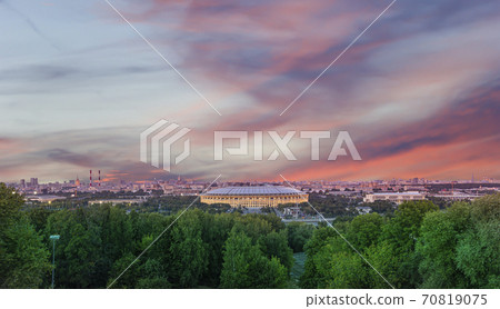 view of central Moscow from Sparrow Hills or Vorobyovy Gory observation (viewing) platform at sunset-- is on a steep bank 85 m above the Moskva river, or 200 m above sea level. Russia view of central Moscow from Sparrow Hills or Vorobyovy Gory observation (viewing) platform at sunset-- is on a steep bank 85 m above the Moskva river, or 200 m above sea level. Russia 70819075
