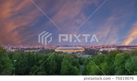 view of central Moscow from Sparrow Hills or Vorobyovy Gory observation (viewing) platform at sunset-- is on a steep bank 85 m above the Moskva river, or 200 m above sea level. Russia view of central Moscow from Sparrow Hills or Vorobyovy Gory observation (viewing) platform at sunset-- is on a steep bank 85 m above the Moskva river, or 200 m above sea level. Russia 70819076