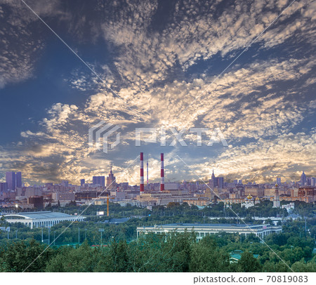 view of central Moscow from Sparrow Hills or Vorobyovy Gory observation (viewing) platform at sunset-- is on a steep bank 85 m above the Moskva river, or 200 m above sea level. Russia 70819083