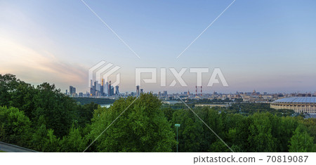 view of central Moscow from Sparrow Hills or Vorobyovy Gory observation (viewing) platform at sunset-- is on a steep bank 85 m above the Moskva river, or 200 m above sea level. Russia view of central Moscow from Sparrow Hills or Vorobyovy Gory observation (viewing) platform at sunset-- is on a steep bank 85 m above the Moskva river, or 200 m above sea level. Russia 70819087