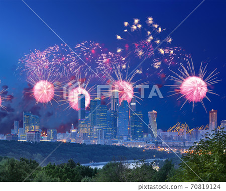 Fireworks over the Moscow city from Sparrow Hills or Vorobyovy Gory observation platform-- is on a steep bank 85 m above the Moskva river, or 200 m above sea level. Russia Fireworks over the Moscow city from Sparrow Hills or Vorobyovy Gory observation platform-- is on a steep bank 85 m above the Moskva river, or 200 m above sea level. Russia 70819124
