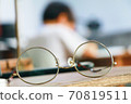 Parents watching over their children's studies 70819511